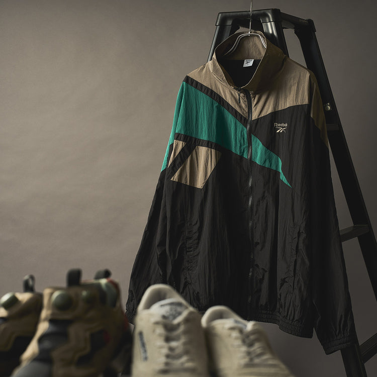 REEBOK | リーボック Begin別注 ’90s復刻ベクターウィンドジャケット