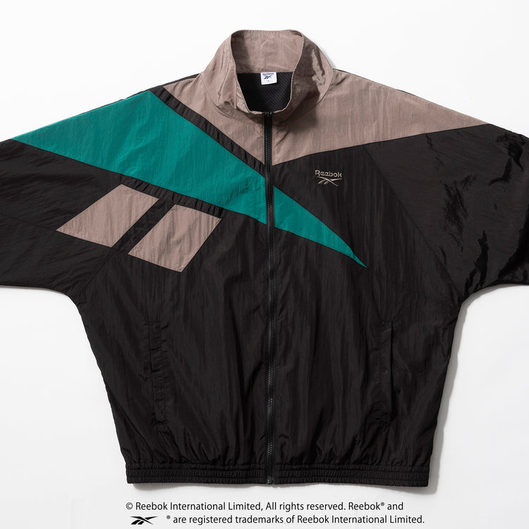REEBOK | リーボック Begin別注 ’90s復刻ベクターウィンドジャケット