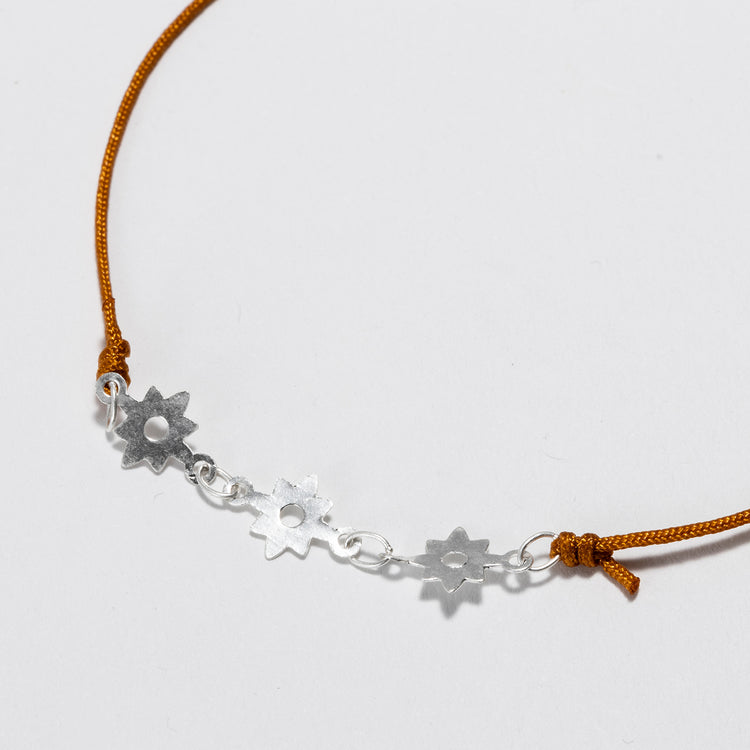 rapiécage | ラピエサージュ　フラワープレートコードブレス